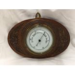 AN ARTS & CRAFTS STYLE BAROMETER