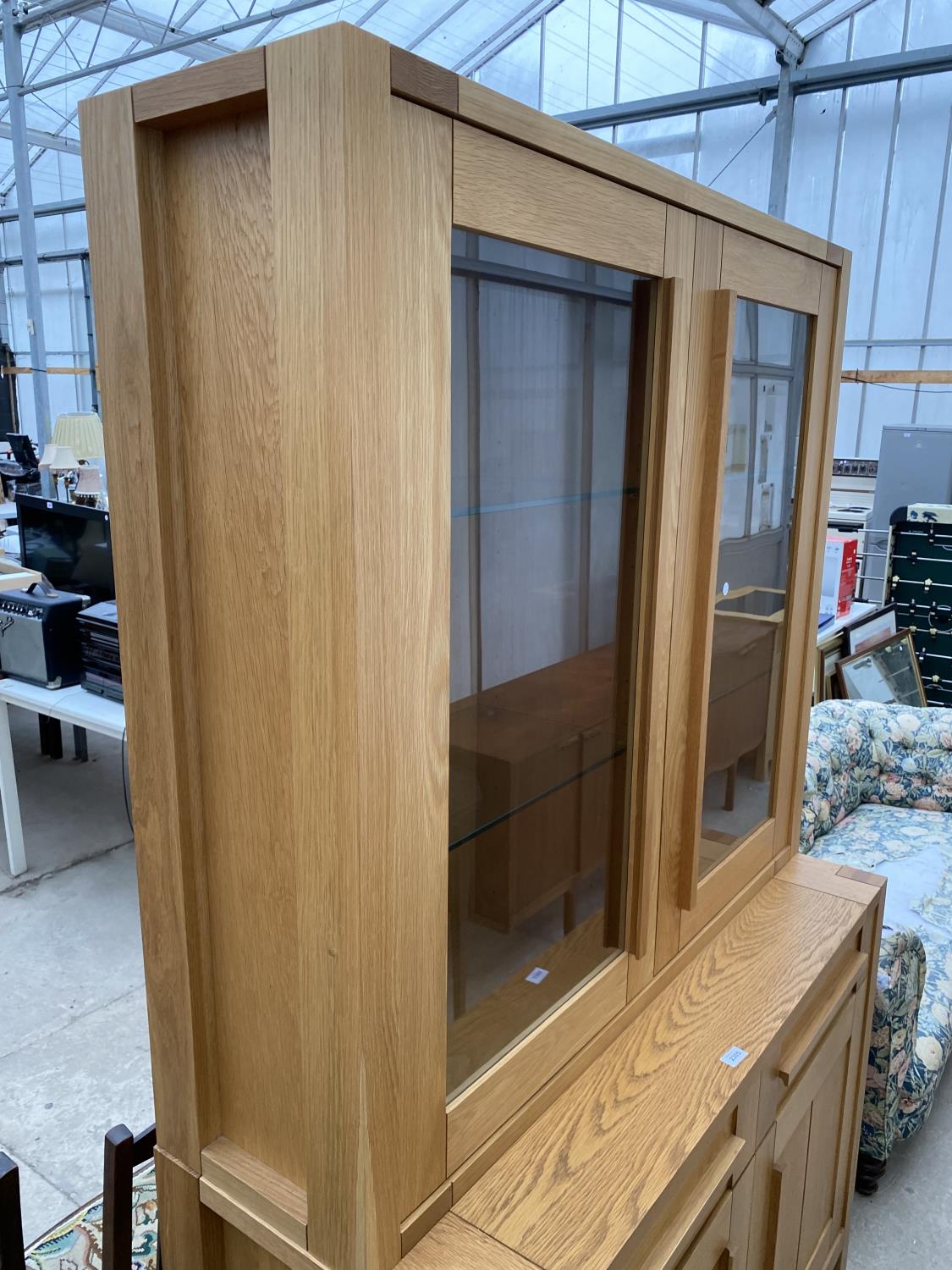 A MODERN OAK MARKS & SPENCER TWO DOOR GLAZED BOOKCASE ON BASE, 48" WIDE - Image 3 of 7