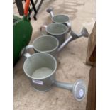FOUR SMALL TIN WATERING CANS