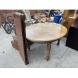 A VICTORIAN MAHOGANY WIND OUT DINING TABLE, 56" X 47" (TWO LEAVES 19" EACH) ON TURNED AND CARVED