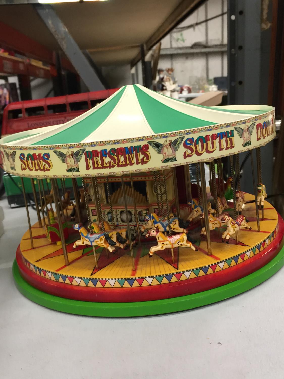 AN ELECTRIC MODEL CIRCUS MERRY GO ROUND - Image 2 of 4