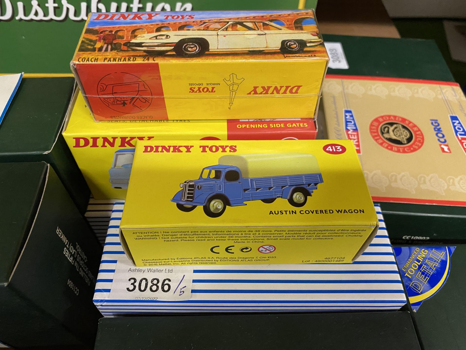 FIVE BOXED ATLAS DINKY MODELS COMPRISING OF A BEDFORD TIPPER, AUSTIN ETC