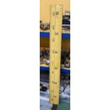 A LARGE 6FT WOODEN MEASURING BOARD / SIGN