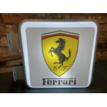 A FERRARI DOUBLE SIDED ILLUMINATED LIGHT BOX SIGN WITH BRACKET - WORKING ORDER AT TIME OF