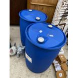 TWO BLUE PLASTIC DRUMS