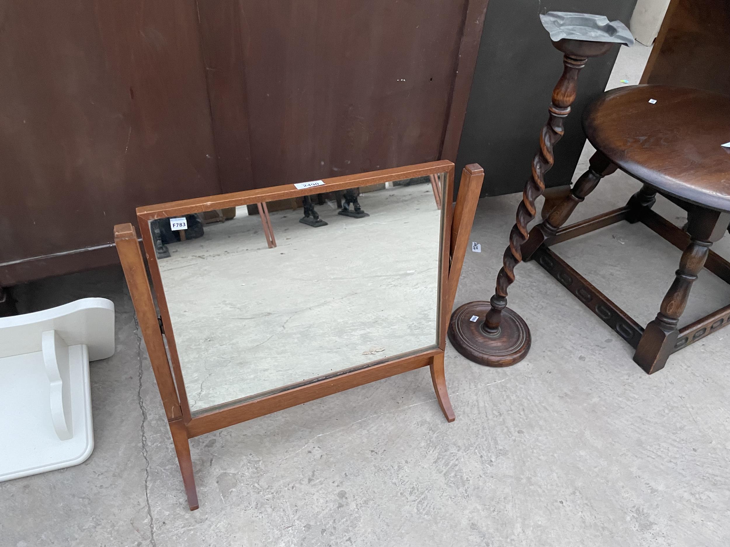 AN EARLY 20TH OAK BARLEYTWIST ASH TRAY STAND AND SWING FRAME DRESSING MIRROR