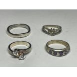 FOUR SILVER RINGS