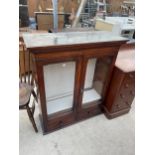 A 19TH CENTURY TWO DOOR GLAZED BOOKCASE WITH TWO DRAWERS TO THE BASE, 34" WIDE