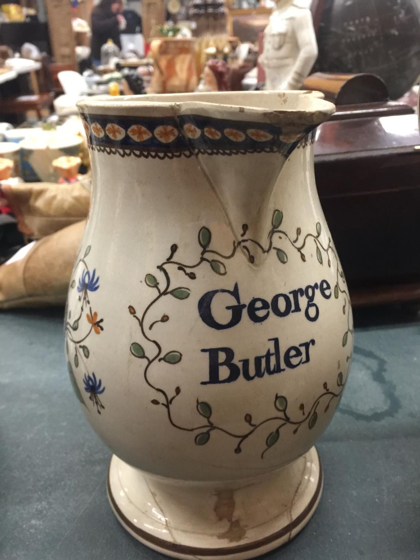 TWO VINTAGE JUGS, ONE 'GEORGE BUTLER' - A/F, THE OTHER A LARGE VICTORIAN TRANSFER PRINTED - A/F - Image 2 of 3