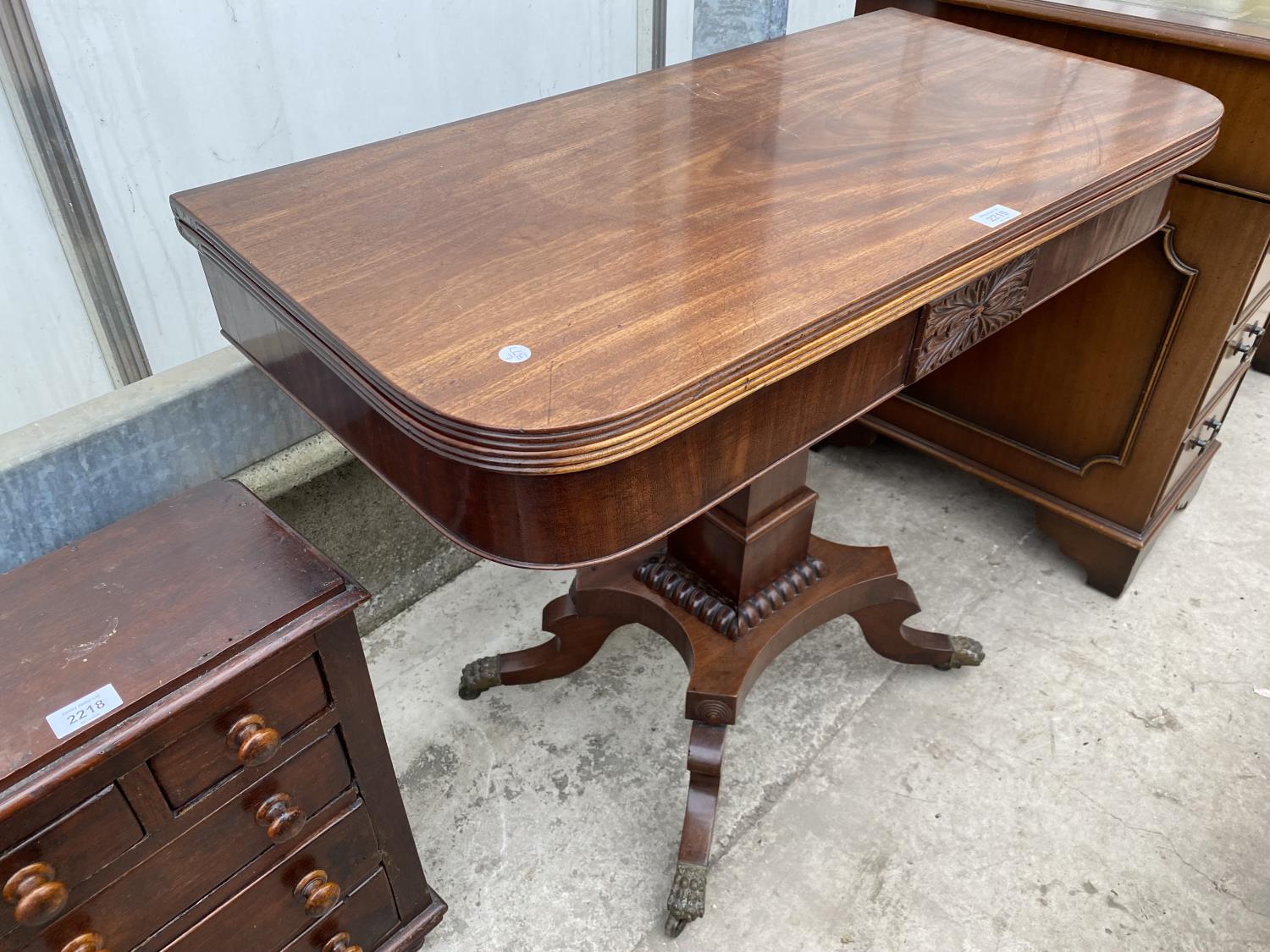 A 19TH CENTURY MAHOGANY FOLD-OVER CARD TABLE ON QUATREFOIL BASE WITH BRASS LION PAW FEET, 35" WIDE - Image 3 of 7