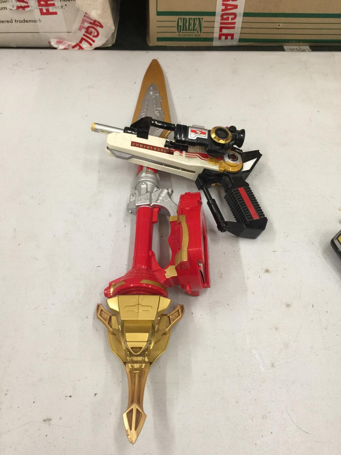 A QUANTITY OF POWER RANGER WEAPONS AND ACCESSORIES TO INCLUDE A PHONE, GUN, SWORDS, ETC - Image 3 of 3