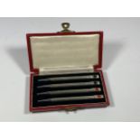 A CASED SET OF STERLING SILVER CARD SUIT PENCILS