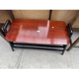 A 1960'S RETRO TWO TIER COFFEE TABLE WITH BLACK LEGS AND UNDERTIER