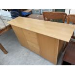 A MODERN SIDEBOARD ENCLOSING FOUR DRAWERS AND TWO CUPBOARDS, 58.5" WIDE