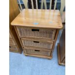 A MODERN PINE CHEST OF THREE WICKER DRAWERS, 19" WIDE