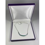 A BOXED SILVER NECKLACE