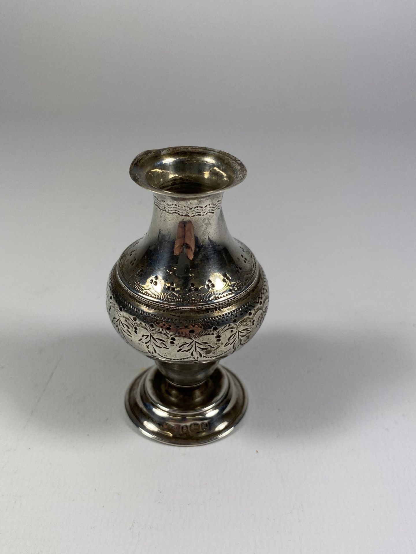 A SMALL HALLMARKED SILVER VASE