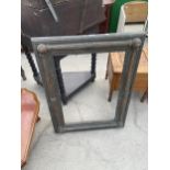 A VICTORIAN MIRROR/PICTURE FRAME WITH BALL AND FLUTED RAISED DECORATION, 33" X 25"