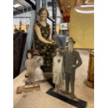 FIVE WOODEN CUT-OUTS OF VINTAGE FIGURES ON WOODEN STANDS