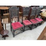 A SET OF FOUR OAK JACOBEAN STYLE DINING CHAIRS WITH CARVED BACK PANEL, TURNED FRONT LEGS AND