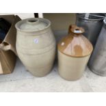 A STONEWARE FLAGGON AND AN EARTHENWARE BARREL