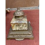 A VINTAGE GLASS INK WELL WITH BRASS STAND AND LID