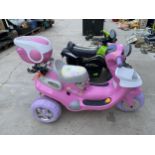 A CHILDRENS HELLO FRIEND ELECTRIC RIDE ALONG TRIKE WITH CHARGER BELIEVED IN WORKING ORDER BUT NO