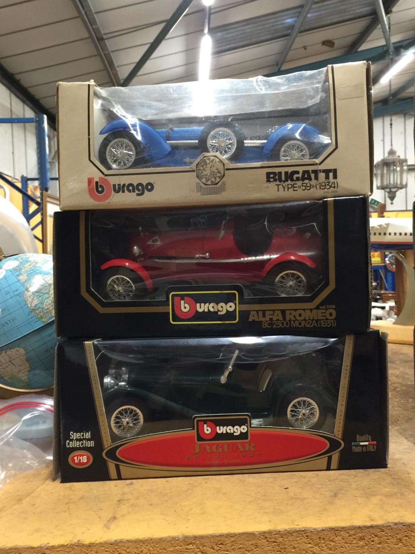 THREE BOXED BURGATO CARS