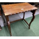 A BRASS INLAID WOODEN SIDE TABLE