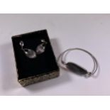 A BOXED SILVER EARRING AND BRACELET SET
