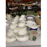 A LARGE QUANTITY OF WHITE CHINA CUPS, SAUCERS, PLATES, JUGS, ETC
