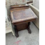 A VICTORIAN WALNUT AND INLAID CANTERBURY