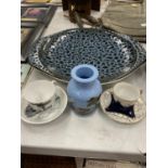 A LARGE POOLE POTTERY WALL CHARGER DIAMETER 34.5CM PLUS CUPS, SAUCERS AND A VICTORIAN BLUE VASE