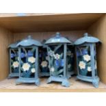 SIX DECORATIVE CAST IRON CANDLE LANTERNS WITH FLORAL AND BIRD DESIGN