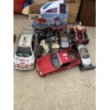 AN ASSORTMENT OF TOYS TO INCLUDE MODEL CARS AND REMOTE CONTROL CARS ETC