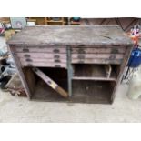 A LARGE VINTAGE PINE HABERDASHERY UNIT WITH EIGHT INTERNAL DRAWERS WITH SCOOP HANDLES (131CM X 101CM