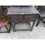 AN OAK JACOBEAN STYLE SIDE-TABLE WITH SINGLE DRAWER ON TURNED LEGS AND STRETCHERS, 25" WIDE