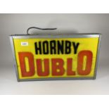 AN ILLUMINATED "HORNBY DUBLO" SIGN (LENGTH 48CM, HEIGHT 28CM, DEPTH 10CM)