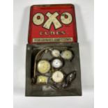 A VINTAGE OXO TIN CONTAINING ASSORTED VINTAGE WATCH HEADS ETC