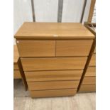 A MODERN OAK EFFECT CHEST OF TWO SHORT AND FOUR LONG DRAWERS, 32" WIDE