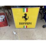 A LARGE FERRARI ILLUMINATED LIGHT BOX SIGN - WORKING ORDER AT TIME OF CATALOGUING. WIDTH 61CM,