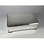 AN ART DECO 1930'S HALLMARKED BIRMINGHAM SILVER OVER-SIZED CIGARETTE BOX WITH SHELL-MEX & B.P