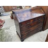 A GEORGE III MAHOGANY BUREAU ON BRACKET FEET WITH FALL FRONT, INNER FITTED DRAWERS AND TWO SHORT AND
