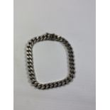 A SILVER CURB BRACELET