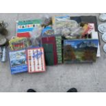 AN ASSORTMENT OF VINTAGE AND RETRO BOARD GAMES AND JIGSAW PUZZLES