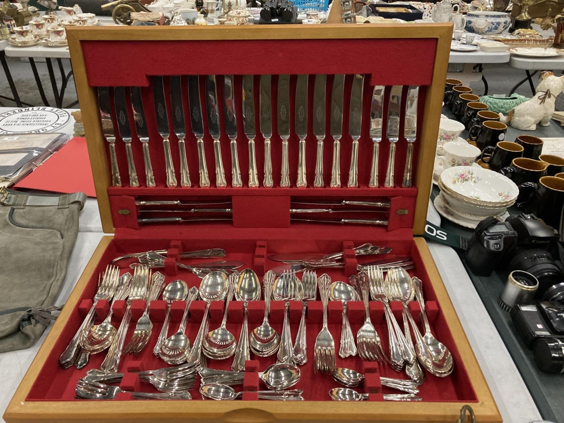 A LARGE CANTEEN OF CUTLERY IN A TEAK BOX