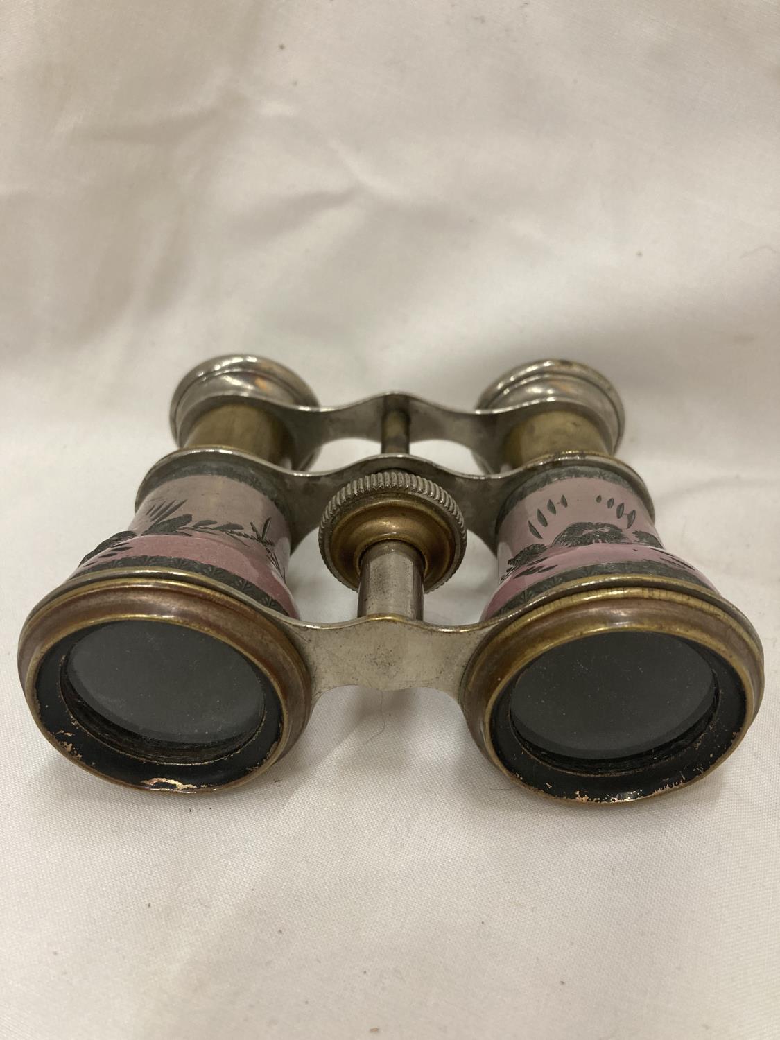 A VINTAGE PAIR OF 'LAMIER' PARIS OPERA GLASSES WITH PINK ENAMELLED DECORATION