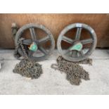 TWO VINTAGE WHEELS AND CHAIN PULLEYS