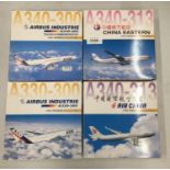 FOUR BOXED 1:400 SCALE PREMIERE COLLECTION MODELS