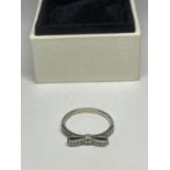 A PANDORA BOW DESIGN SILVER RING IN A PRESENTATION BOX